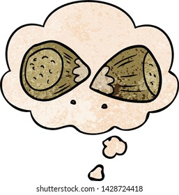 cartoon hazelnuts with thought bubble in grunge texture style