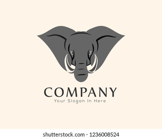 Cartoon head elephant from front view logo design inspiration