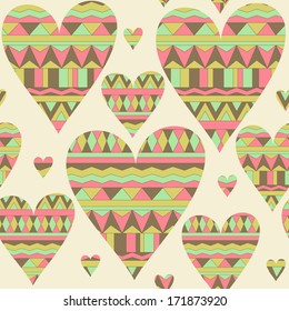 Cartoon hearts seamless pattern. Tribal style. Valentines day card design. Multicolored triangles.