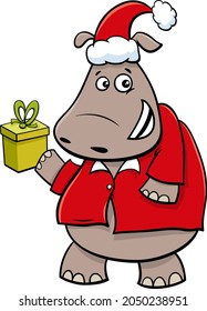 Cartoon Illustration Of Hippopotamus Animal Character With Present On Christmas Time