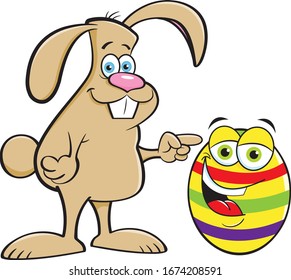 Cartoon illustration of a rabbit pointing to a decorated Easter egg.