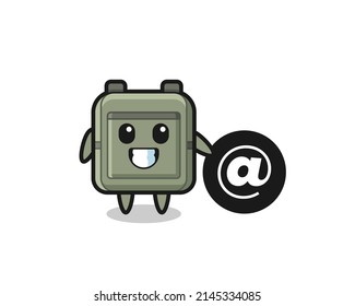 Cartoon Illustration of school bag standing beside the At symbol , cute design