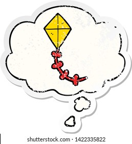 cartoon kite with thought bubble as a distressed worn sticker