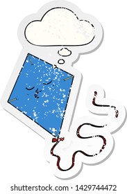cartoon kite with thought bubble as a distressed worn sticker