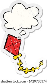 cartoon kite with thought bubble as a distressed worn sticker