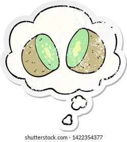 cartoon kiwi with thought bubble as a distressed worn sticker
