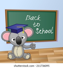Cartoon Koala wrote chalk on a blackboard