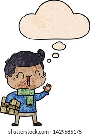 cartoon laughing boy with thought bubble in grunge texture style