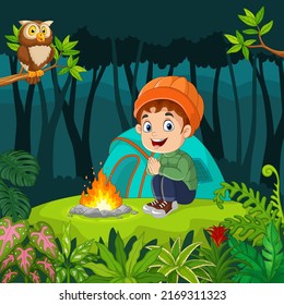 Cartoon little boy camping in the jungle