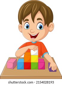 Cartoon little boy playing cubes on table