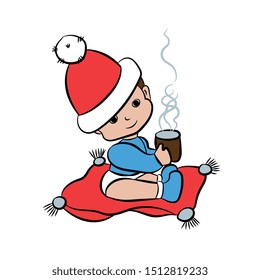 А cartoon little boy with a Santa Claus hat sits on a big red pillow and drinks hot chocolate from a mug.
