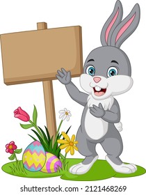 Cartoon little bunny with easter eggs, flowers and blank plank sign in the grass