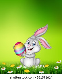 Cartoon little bunny holding Easter egg