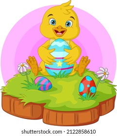 Cartoon little chick with easter egg in the grass