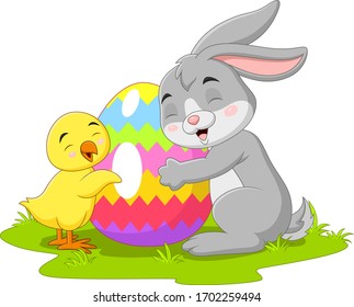 Cartoon little rabbit with chick and easter egg