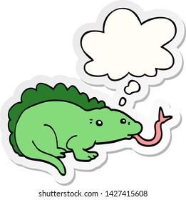 cartoon lizard with thought bubble as a printed sticker