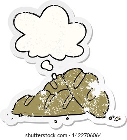 Cartoon-Brotlaibe mit Denkblase als bedrückter abgenutzter Aufkleber