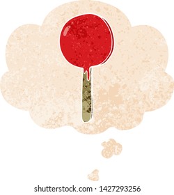 cartoon lollipop with thought bubble in grunge distressed retro textured style