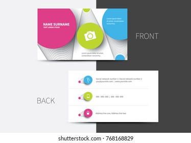 Cartoon look business card layout in blue, green and magenta color with icons

