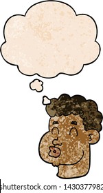 cartoon male face with thought bubble in grunge texture style