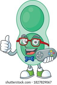 Cartoon mascot design of green streptococcus pneumoniae play a game with controller. Vector illustration