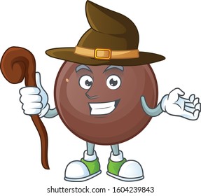 Cartoon Mascot Style Of Chocolate Ball Dressed As A Witch