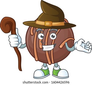 Cartoon Mascot Style Of Chocolate Praline Ball Dressed As A Witch