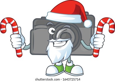 cartoon mascot style of digital camera in Santa costume with candy