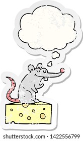 cartoon mouse sitting on cheese with thought bubble as a distressed worn sticker