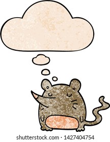 cartoon mouse with thought bubble in grunge texture style