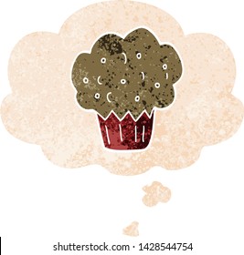 Cartoon-Muffin mit Gedankenblase in brüchiger Retro-strukturierter Form