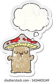 cartoon mushroom creature with thought bubble as a distressed worn sticker