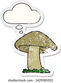 cartoon mushroom with thought bubble as a distressed worn sticker
