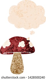 cartoon mushroom with thought bubble in grunge distressed retro textured style