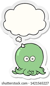 cartoon octopus with thought bubble as a printed sticker