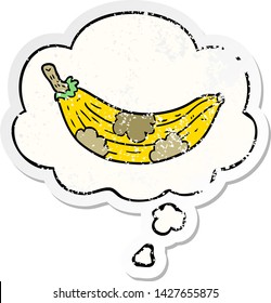 cartoon old banana with thought bubble as a distressed worn sticker
