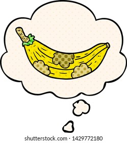 cartoon old banana with thought bubble in comic book style