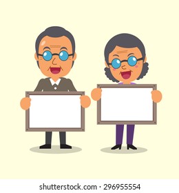 Cartoon old man and old woman holding board for presentation