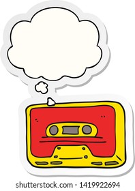 cartoon old tape cassette with thought bubble as a printed sticker