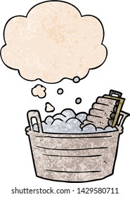 cartoon old washboard and bucket with thought bubble in grunge texture style