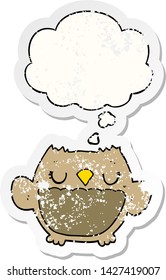 cartoon owl with thought bubble as a distressed worn sticker