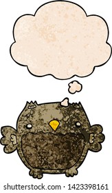 cartoon owl with thought bubble in grunge texture style