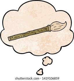 cartoon paint brush with thought bubble in grunge texture style