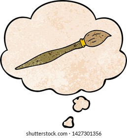 Cartoon-Malerpinsel mit Gedankenblase im farbigen Grunge-Stil