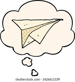 cartoon paper airplane with thought bubble in comic book style