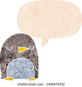 cartoon penguin with speech bubble in grunge distressed retro textured style