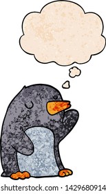 pingüino de dibujos animados con burbuja de pensamiento en forma de textura gruesa