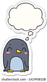 cartoon penguin with thought bubble as a printed sticker