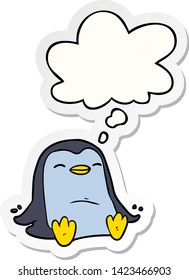 cartoon penguin with thought bubble as a printed sticker