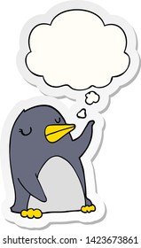 cartoon penguin with thought bubble as a printed sticker